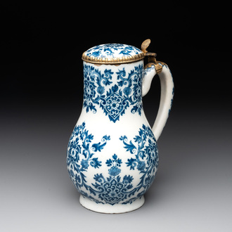 A fine blue and white Dutch Delft gilt-silver-mounted ewer and cover in the style of Daniel Marot, ca. 1700