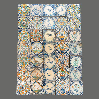 35 polychrome and blue and white Dutch Delft tiles, 16/17th C.