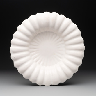 A fine white Dutch Delft gadrooned dish, 17th C.