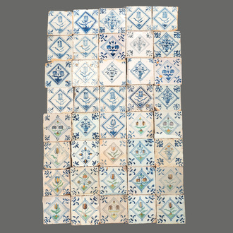 40 Dutch Delft blue, white and polychrome 'diamond' tiles with flowers, 17/18th C.