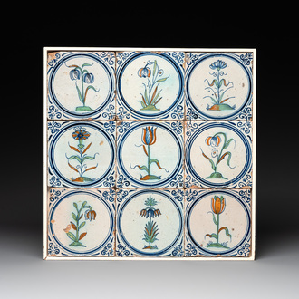 A field of nine polychrome Dutch Delft tiles with flowers, 17th C.