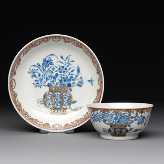 A Chinese gilt-decorated blue- and-puce-enamelled 'flower basket' cup and saucer, Qianlong