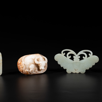 Four Chinese white, celadon and russet jade pendants, Qing/Republic