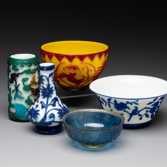 A Chinese blue-overlay white Beijing glass vase, a multi-colour brush pot and three bowls, 19th C.