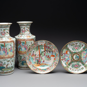 A pair of Chinese Canton famille rose vases and two plates, 19th C.