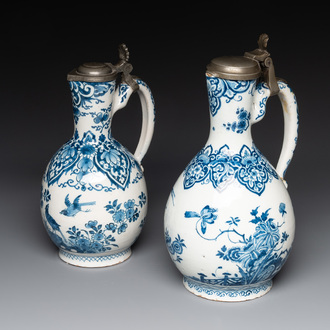 Two blue and white Dutch Delft jugs with pewter mounts, early 18th C.