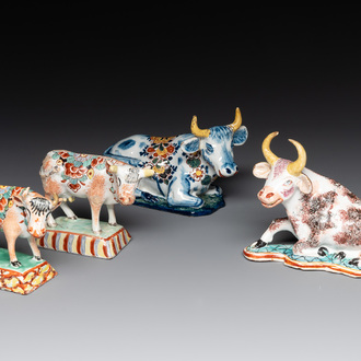 Four polychrome and petit feu Dutch Delft cows, 18th C.