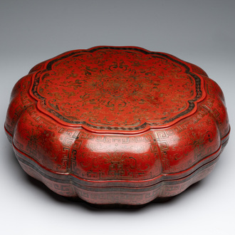 A Chinese red lacquer box and cover with floral design, 19/20th C.