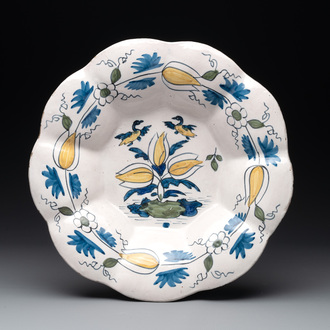 A polychrome Dutch Delft dish with ducks and flowers, late 17th C.