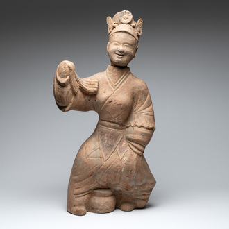 A large Chinese terracotta sculpture of a dancer, possibly Han