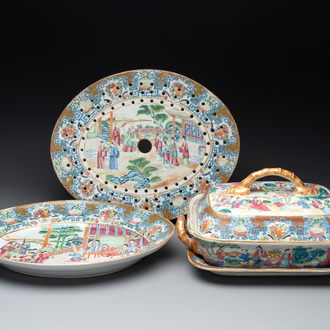 A Chinese Canton famille rose 'mandarin subject' oval dish, a strainer, a covered tureen and stand, 19th C.