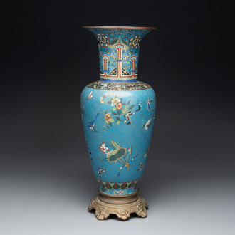 A Chinese cloisonné 'birds, butterflies and flowers' vase, 19th C.