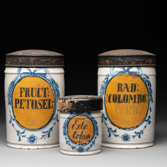 Three rare blue and white Delftware albarelli with painted content medallions and paper shop labels, Northern Europe, 18th C.