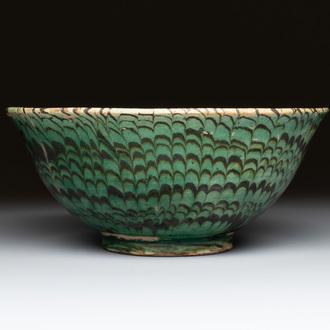 A Chinese green-glazed marbled bowl, probably Tang