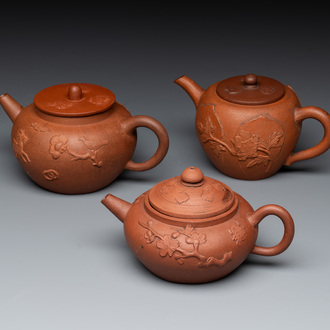 Three Chinese Yixing stoneware teapots and covers, 18th C.