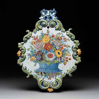 A polychrome Dutch Delft 'flower basket' plaque, dated 1759