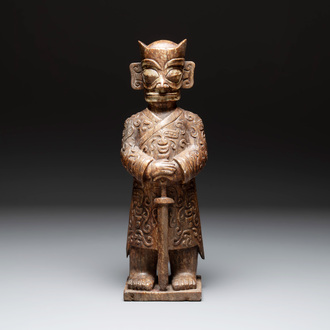 A Chinese Sanxingdui-style marble sculpture of a warrior, 20th C.