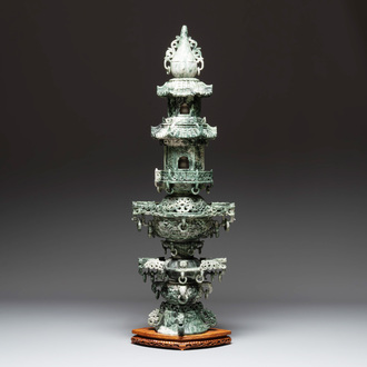 A large Chinese jade pagoda on wooden stand, 20th C.