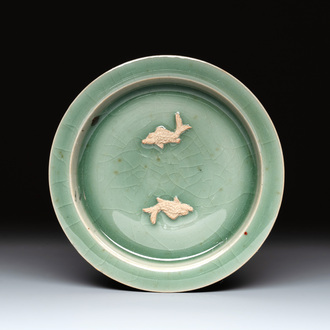 A Chinese Longquan celadon 'twin fish' plate, Yuan/Ming