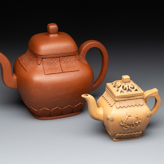 Two Chinese Yixing stoneware teapots, seal marks, 19th C.