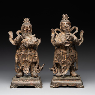 A pair of fine Chinese gilt bronze heavenly kings on stand, Ming