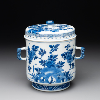 A Chinese blue and white two-handled container and cover with floral design, Kangxi