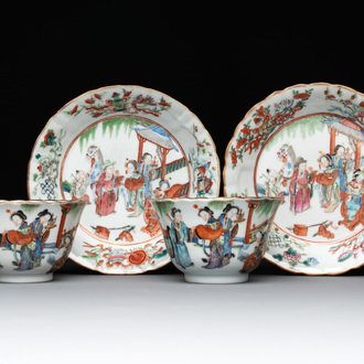 A pair of Chinese famille rose cups and saucers with figural design, Xianfeng mark and of the period