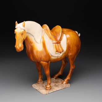 A Chinese sancai-glazed model of a horse, Tang