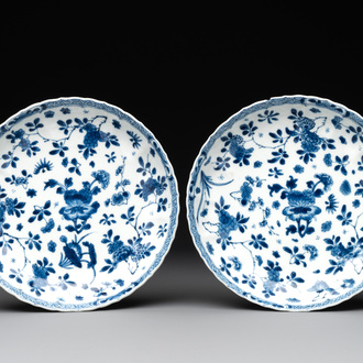 A pair of Chinese blue and white plates with floral design, Kangxi mark and of the period