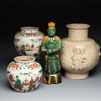 A Chinese sancai figure of Garuda, a cream-glazed vase and a pair of wucai jars, 19th C.