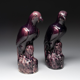 A pair of Chinese aubergine-glazed eagles, 19th C.