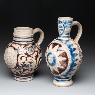 Two Westerwald stoneware jugs, one dated 1715, 18th C.