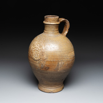 A Raeren stoneware jug, dated 1675