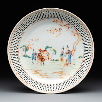 A Chinese famille rose 'mandarin subject' dish with a reticulated border, Qianlong