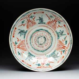 A Chinese Swatow iron-red and green-enamelled 'Leaping carps' dish, Ming
