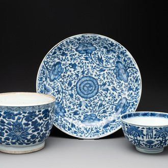 A Chinese blue and white 'lotus' jardinière, a 'peony' dish and a 'shou' bowl, Kangxi