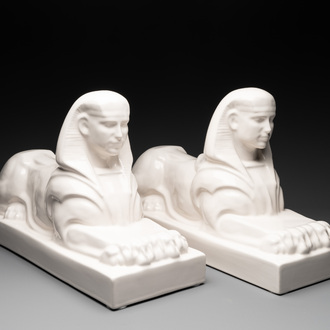 A pair of large white-glazed shop display models of sphinxes, Petrus Regout, Maastricht, 20th C.