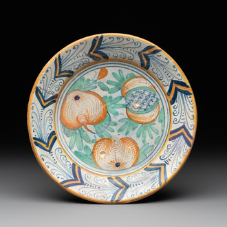 A polychrome Dutch maiolica 'pomegranates' plate, 1st half 17th C.