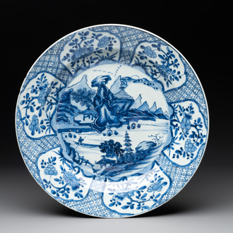 A Chinese blue and white 'mountainous river landscape' dish, lozenge mark, Kangxi