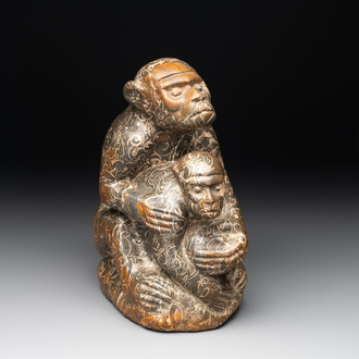 A Chinese stone group of a two monkeys, 20th C.