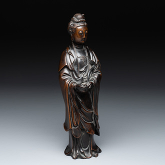 A Chinese bronze Guanyin holding a ruyi, 17/18th C.
