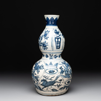 A Chinese blue and white 'flying horse' double gourd vase, Wanli