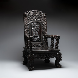 A Chinese richly carved and lacquered hongmu armchair, Canton, 19th C.