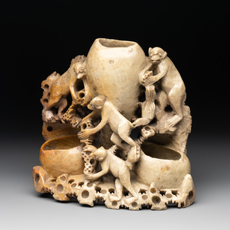 A Chinese soapstone water container with four monkeys, 20th C.