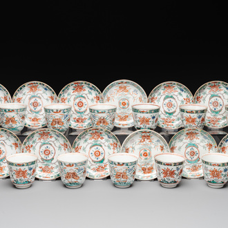 A set of 12 Chinese famille verte cups and saucers with floral design, Kangxi