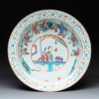 A Chinese famille rose 'ladies and playing boys' basin, 19th C.