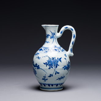 A Chinese blue and white ewer with floral design, Transitional period