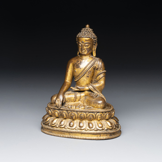 A fine Sino-Tibetan gilt bronze Buddha, 15/16th C.