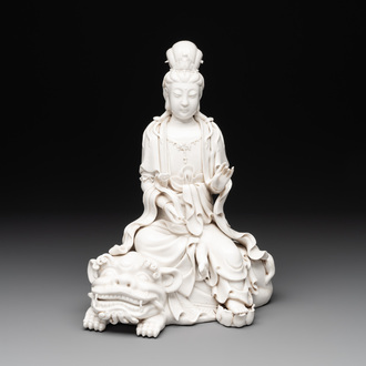 A Chinese Dehua blanc de Chine Guanyin seated on a lion, 20th C.