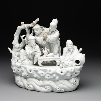 A Chinese Dehua blanc de Chine group of four deities on a boat, Republic